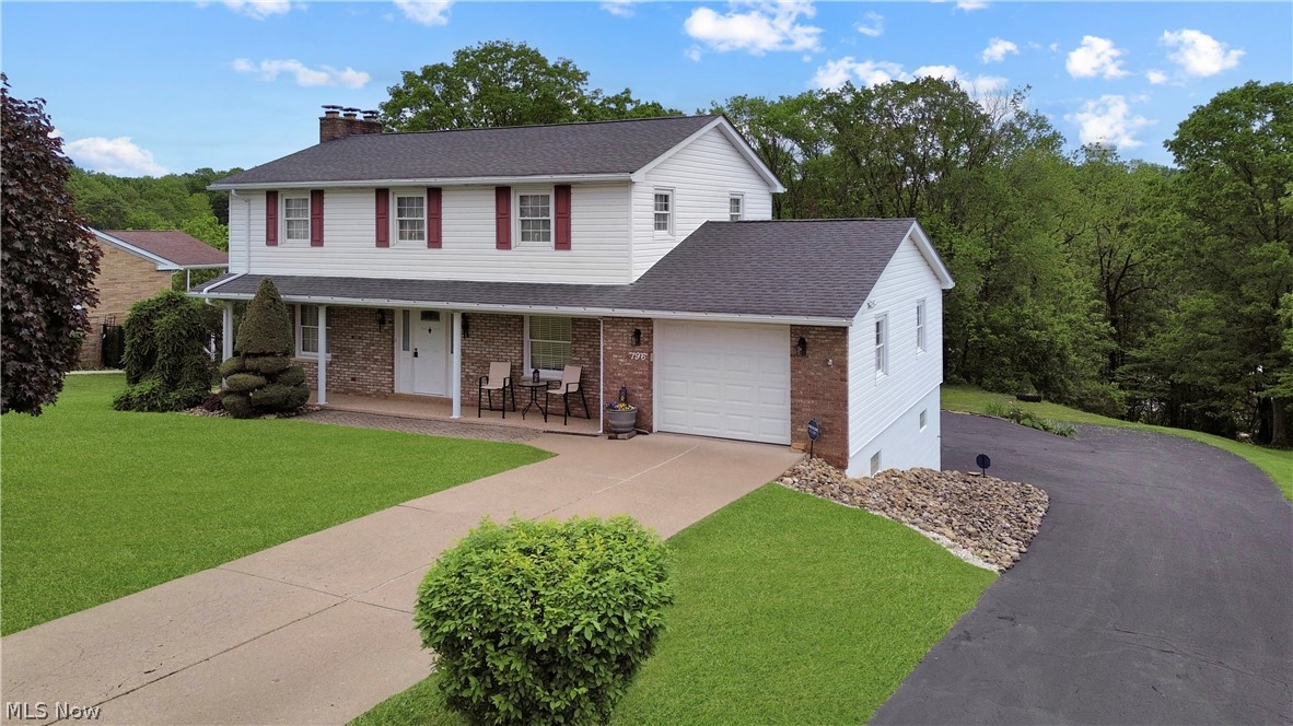 This beautifully maintained 4-bedroom home on over an acre of land offers the perfect blend of comfort, functionality, and space both inside and out! Step inside to find a welcoming layout featuring a spacious living room with brick fireplace as focal point, formal dining room, and a well-appointed kitchen ideal for everyday living and entertaining alike. The main level also includes a convenient half bath for guests.

Upstairs, you’ll find four traditional bedrooms including a primary suite complete with its own private half bath, along with a full bathroom serving the additional bedrooms. The spacious basement provides even more living and storage potential and features a full bath, making it perfect for recreation, hobbies, or additional guest space.

Outside, enjoy a beautiful backyard retreat with a covered porch perfect for relaxing evenings, entertaining, or morning coffee. Car enthusiasts, hobbyists, or those needing extra storage will love the 1 car garage upstairs and one located downstairs in the home, In addition to the massive detached garage offering endless possibilities for workshop space, additional vehicles, boat storage, equipment, or recreational toys.

A rare combination of space, functionality, and outdoor enjoyment — this home is ready for its next owner to make lasting memories!