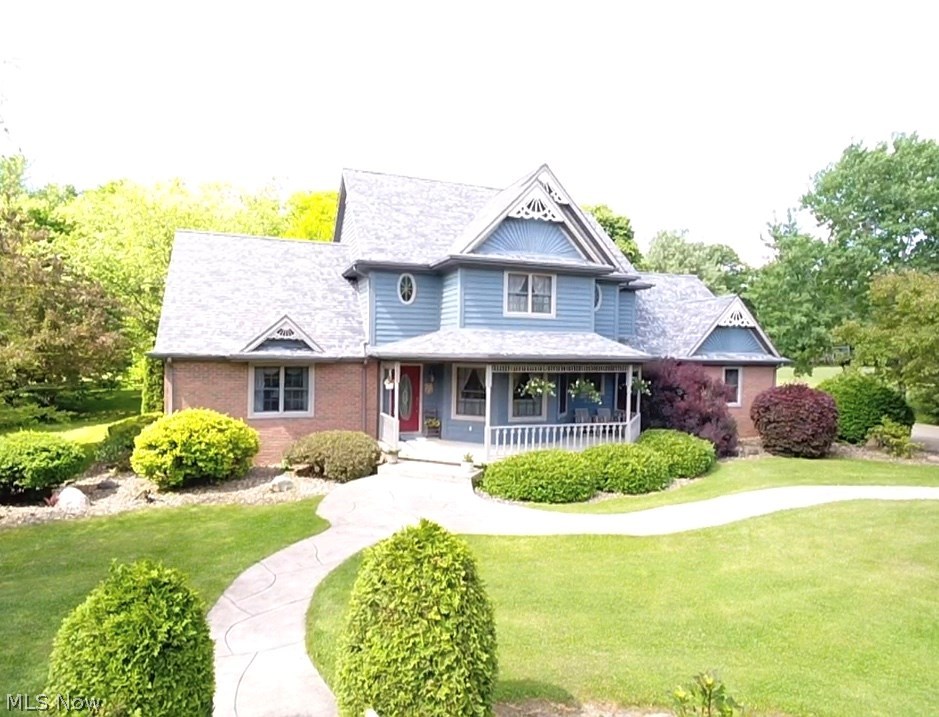 Begin & end your home search with this exceptional 3 bedroom, 3.5 bath residence situated on 2.55 private acres in Lordstown. The first thing you'll notice about this home is the attention to detail. The owner gives a nod to Victorian-style architecture with the charming front porch and decorative trim, while maintaining the home's traditional feel. The exterior of this house takes outdoor living to the next level - barbecuing on the deck, cocktails in the gazebo or picnics by the pond. Just imagine the parties you could host here! At 3,600 square feet, the interior of this home offers plenty of space and functionality. The first floor has formal living and dining rooms, a spacious eat-in kitchen, cozy family room with gas fireplace, sun room with access to the deck, first-floor laundry and oak flooring & trim. The second-floor master suite features vaulted ceilings, large walk-in closet and attached bath with dual sinks and a jetted tub. Two additional bedrooms and a full bath are on