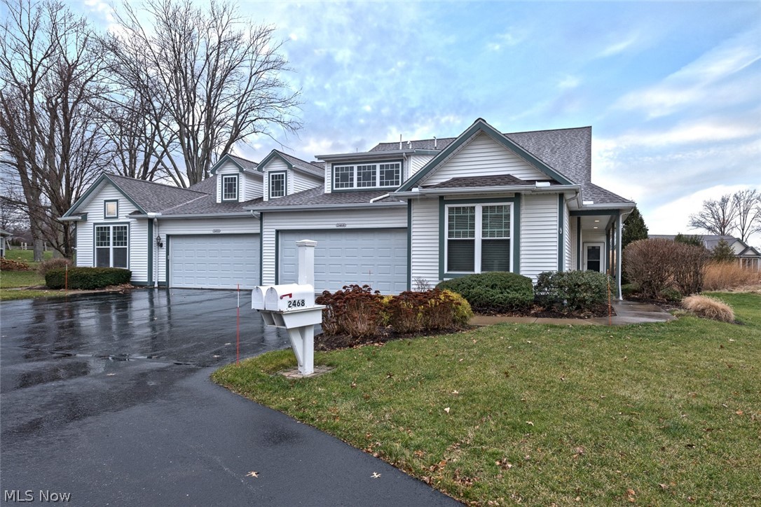 Come home and relax in this beautifully renovated condo in the desirable Avenbury Lakes community in Avon! As you step inside, you will immediately notice the carefully selected details that make this home special, from the hickory hardwood floors to the gorgeous marble kitchen counters. The living room is spacious and open to the dining room, perfect for entertaining! Off of the dining room, you will find a gorgeous three season room that opens out to a private patio. The stunning eat-in kitchen features newer white cabinetry, marble counters, subway tile backsplash and a breakfast bar that overlooks the dining room. A cozy study is located just off of the kitchen. The large master bedroom features a spacious walk-in closet and an en-suite bathroom with quartz counters and a custom, ADA accessible no step shower. A second bedroom, a full bathroom with quartz counters and a laundry room complete this home. Other recent improvements include a newer roof (2017) and newer copper plumbing.