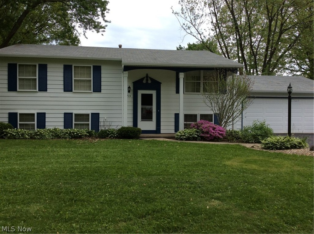 Spacious bi-level with 3 or 4 bedrooms. (Fourth bedroom used as office).  Home is in Warren/Howland schools.  Deck and cement patio off the dining room.  Two car garage.  All kitchen appliances stay along with washer and dryer.  Wood burner in family room.  Call today for an appointment.