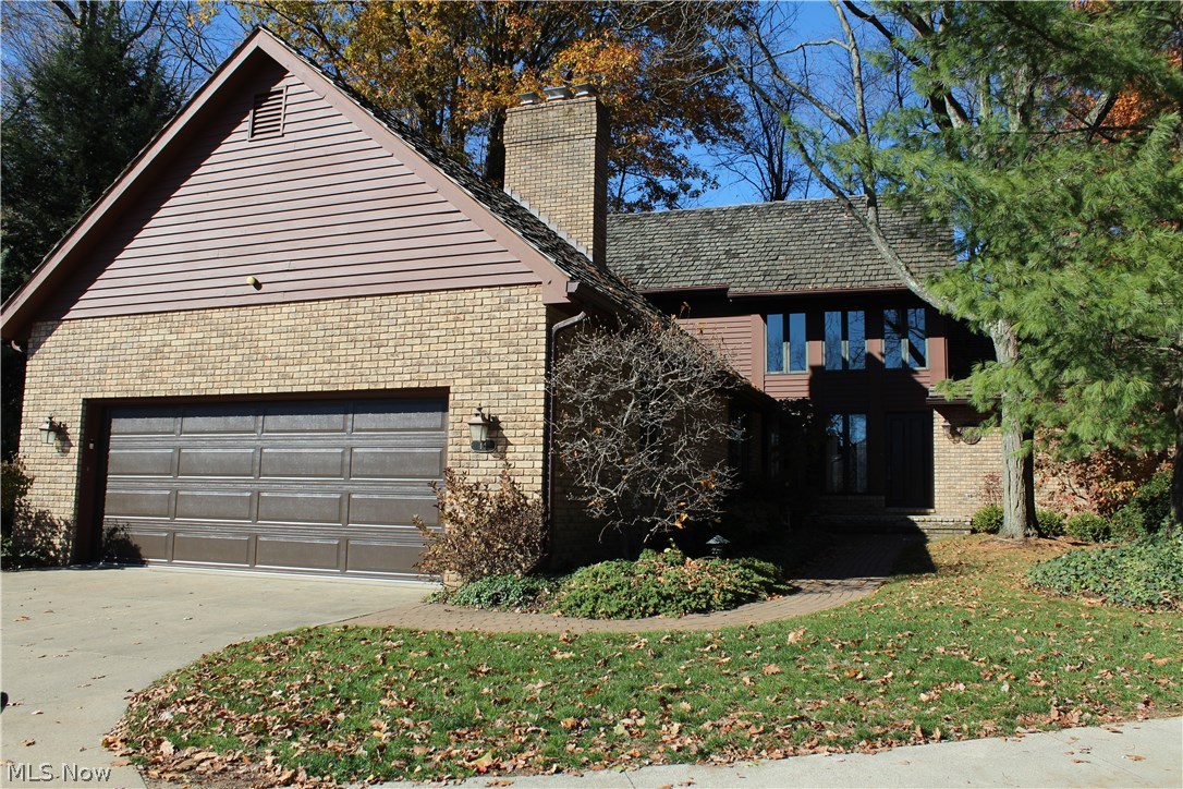 Quality is king in this large condo in North Canton CSD! The impressive 2 story foyer features hard wood flooring & sets the stage for the wonderful family room with hard wood, fireplace & wet bar with granite counter. The living & dining rooms boast crown molding & plush carpet. Additionally, the dining room has French doors that lead to the charming sun porch.  The kitchen, in a league of its own, is equipped with newer appliances, cherry cabinetry with pull out shelves, hard wood floor, granite counters, Insta-Hot water dispenser, tiled back splash & dinette. The 1st floor master suite is adorned with plush carpet & crown molding, plus a large walk in closet & double closets. The spectacular master bath completes the master suite, with Corian counter, tiled shower, skylight, ceramic tiled floor & French doors.  The 2nd floor master features a walk in closet, crown molding, private bath with large tiled shower, jetted tub, separate commode/bidet area & marble vanities, in addition to