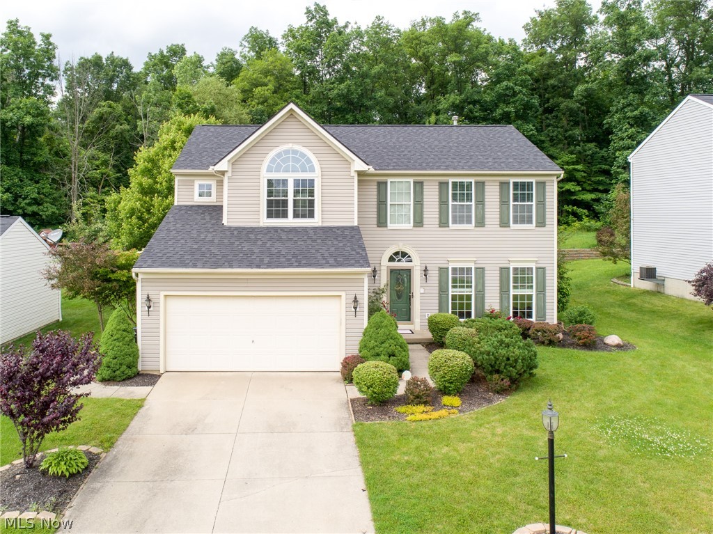 This one has it all, gorgeous two story entryway, leading to large open living room, morning room and kitchen. Granite counter-tops, and loads of cabinet space! Walls of windows leading to an amazing exterior landscape including pavilion. Formal dining room showcasing crown molding, and upstairs office spaces throughout. Four bedrooms located upstairs, with ample closet space. Master bedroom is over-sized, with walk-in closet and an updated bath. This home has a finished lower level and extra full bath. Roof has been replaced with new gutters, and many more updates! This is one to see quick before it's gone!
