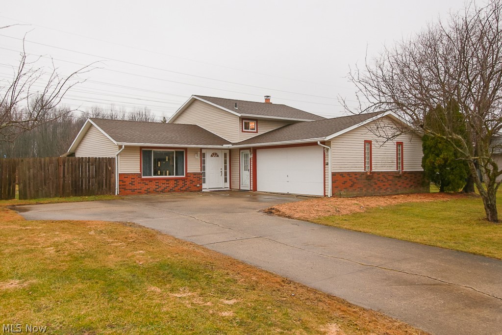 Don't miss your chance to see this gorgeous home in a quiet subdivision. This home is located on a cul-de-sac and is stocked with many great updates/improvements. The home boasts a brand-new roof/tear off (2019) and a renovated kitchen with granite counters, stainless steel appliances and a ceramic tile floor (2021). As you walk through the renovated 3 seasons room you will find a back yard equipped with a brand new 18x18 poured patio for entertaining (2021), a large swing set (2020), a trampoline (2021), a painted gazebo with brand new hot tub (2021) and a new shed (2019). The large backyard is fenced in with a 6-foot privacy fence around the whole yard to keep the kids and pets safe. The dining room/living room floor is wood laminate (2017) and upstairs and down are carpet. Upstairs consists of 3 bedrooms. The master is attached to a jack and jill bathroom. Downstairs is a large family room with a useable fireplace and an extra bedroom or office, as well as another full bath. Laundry
