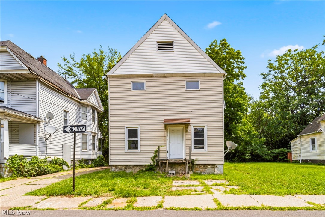 Attention Investors! Come build off of this blank slate featuring a newer roof, vinyl siding and vinyl windows already in place! The rest of the 4 bed 2 bath duplex is ready to be updated in your vision, including potential to add additional living space on the 3rd floor. Fair market rent of over $2500+ possible by adding in additional bedrooms while rehabbing the home.
