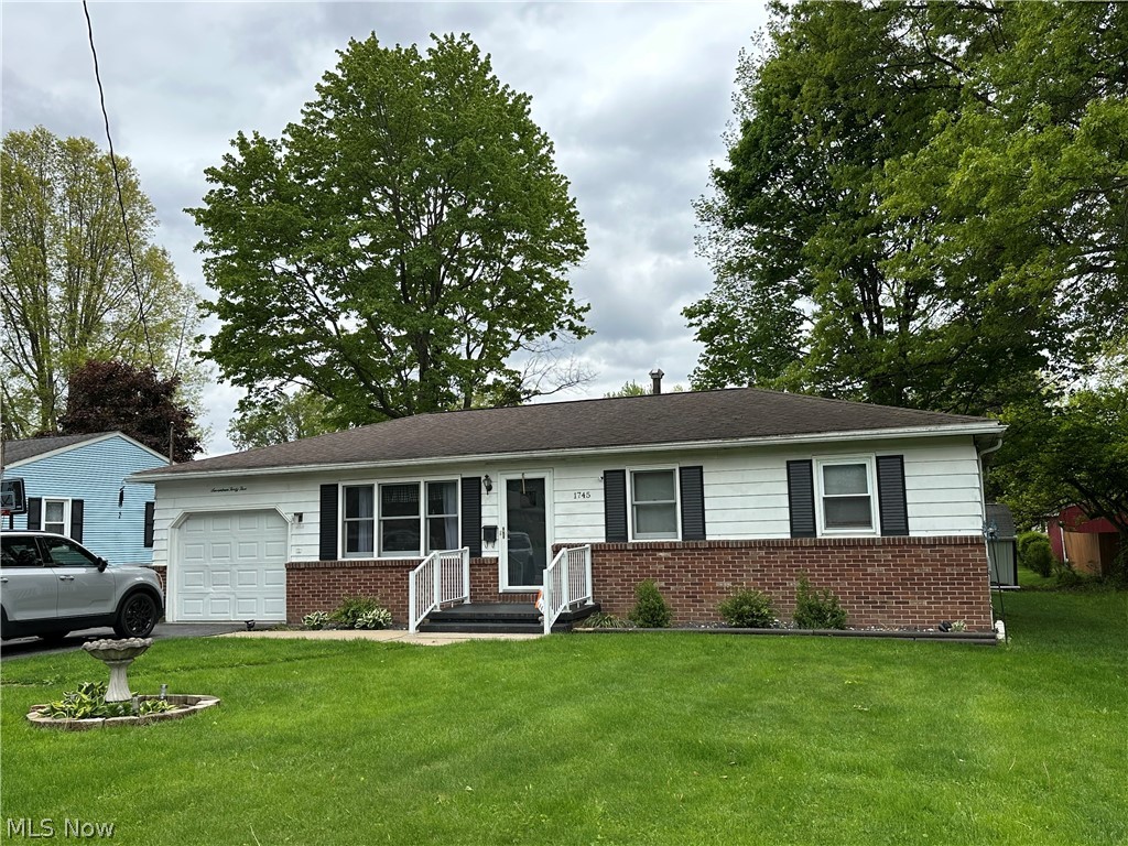 Welcome home to 1745 E 3rd St in Salem!  This Ranch boasts all one level living, updated seamless flooring throughout the home, double sinks in the bathroom, large basement for all your storage needs, and a spacious fully enclosed sunroom that allows for a play area for kids, office space, an extra tv room, weight room/gym...the possibilities are endless!  The shed in the back yard has been newly sided and has electric for all your extra gardening needs.  Furnace and Central Air new in 2021.  Hot Water Tank new in 2025. Unpack your clothes and settle right in as this ranch home is the whole package!