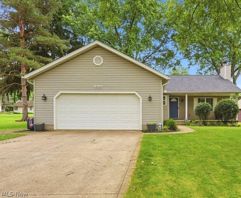 This inviting ranch in Lake Township / North Canton Schools offers the perfect blend of comfort, space, and entertaining potential. Step inside to an open floor plan with luxury vinyl plank flooring and a bright living room featuring vaulted ceilings and a cozy gas fireplace. The kitchen provides plenty of storage, a pantry, and a breakfast bar, flowing seamlessly into the dining area.

Enjoy year-round relaxation in the spacious screened-in porch with hot tub, privacy canvases, and a beautiful wood ceiling. The backyard is equally charming with a fire pit and mature landscaping.

The primary suite offers a walk-in closet and private bath with a rustic sliding barn door. Two additional bedrooms and an updated full bath complete the main level. The finished lower level expands your living space with a full bath, media room with fireplace and wet bar, wine fridge, and multiple flexible rooms — including one that could serve as a 4th bedroom.

With first-floor laundry, great storage, and a 2-car garage, this home truly has it all.
Possession contingent on sellers finding suitable housing.