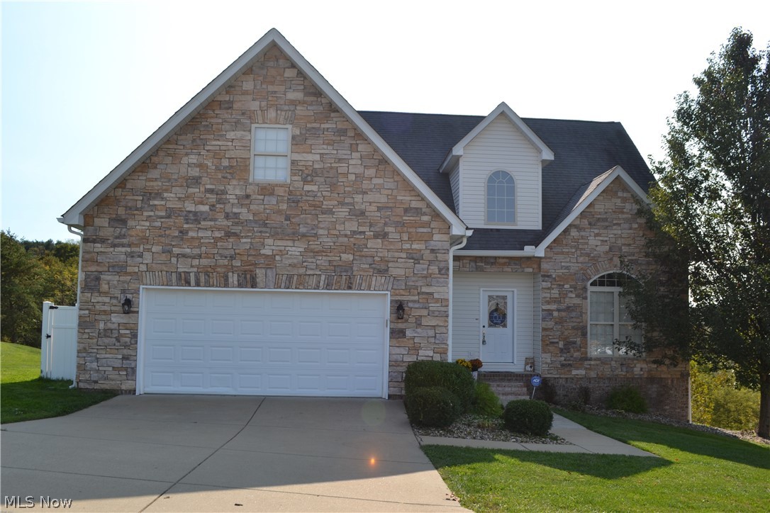 Absolutely gorgeous 4 bedroom, 3.5 bath home in a beautiful subdivision! The first floor offers a two-story entryway, cathedral ceilings, formal dining room, eat-in kitchen with breakfast nook open to the great room with gas fireplace and it leads to the back deck with beautiful views. The master bedroom, bathroom, walk-in closet and laundry area complete the first level. Upstairs you'll find three additional bedrooms, full bath and a balcony overlooking the great room. The walkout basement offers a large family room, extra room perfect for an office, full bath and unfinished storage space. This house truly has too much to mention but you don't want to miss seeing this one!