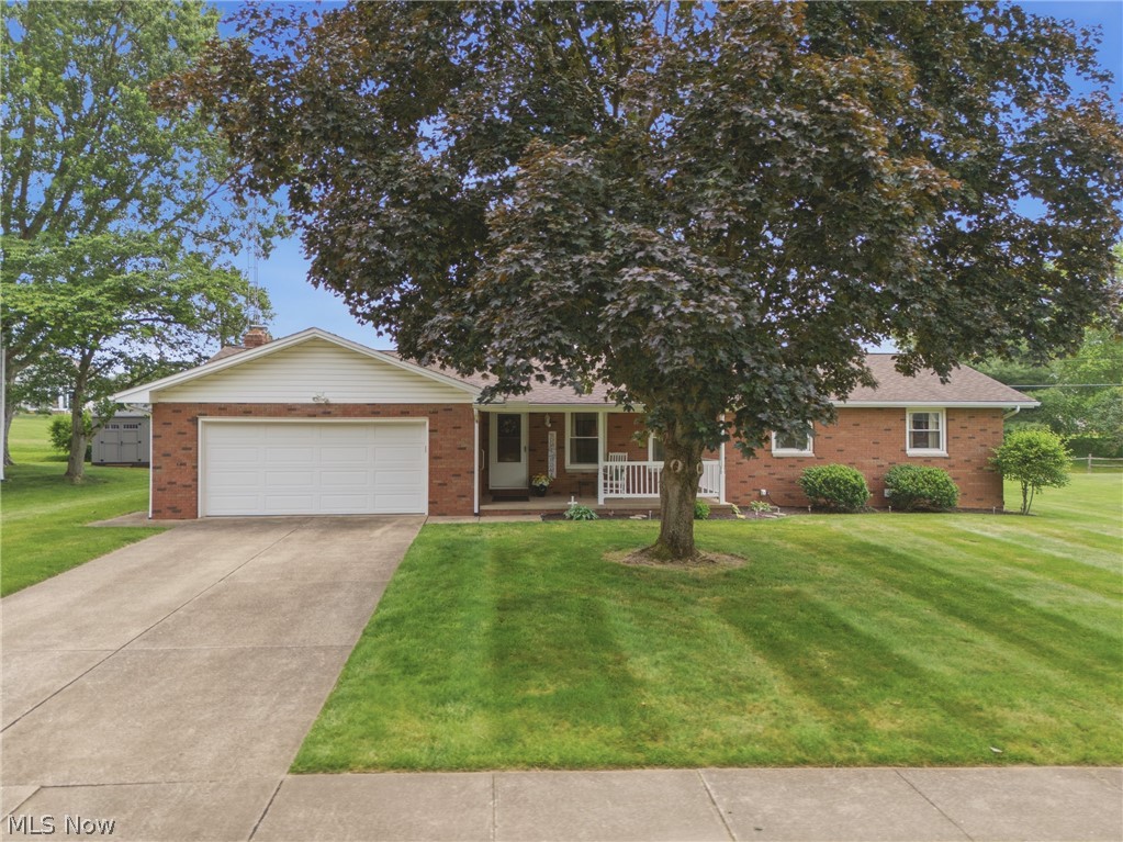 Welcome to 1708 Edmar St, where quality craftsmanship, comfort, and pride of ownership shine throughout this beautifully maintained brick ranch! From the moment you step inside, you'll be greeted by a warm and inviting living room that showcases the home's exceptional care and comfortable living spaces. Continue into the heart of the home where the spacious kitchen offers plenty of room for meal preparation, gatherings, and everyday living. Down the hall, you'll find three generously sized bedrooms, including one featuring a desirable cedar closet for additional storage. A full bathroom is conveniently located just steps from the bedrooms, along with a hallway linen closet and additional bathroom storage. On the opposite side of the home, a stunning brick accent wall frames the cozy gas fireplace, creating the perfect setting to relax and unwind. Sliding patio doors lead to the rear porch, offering a peaceful retreat to enjoy your morning coffee or escape the hustle and bustle of everyday life. The attached two-car garage provides everyday convenience, while the large shed with loft storage offers the perfect place for lawn equipment or seasonal décor. The full basement has been professionally waterproofed and includes a built-in dehumidifier, providing peace of mind and endless possibilities. This home is packed with valuable updates, including a new hot water tank (2025), electronic thermostat (2025), washer (2025), furnace (2020, under warranty through 2030), water softener (2020), roof (2009), windows (2006), and garage door (2006). Additional features include easy-to-clean tilt-in windows, a laundry chute to the basement laundry area, and coat closets at both entrances. Located close to the schools, YMCA, Metzger Park, and the library, this exceptionally clean and well-cared-for home offers the perfect combination of convenience, comfort, and lasting value. Don't miss your opportunity to make this Louisville gem your next home! Muskingum Watershed $2 Annually.