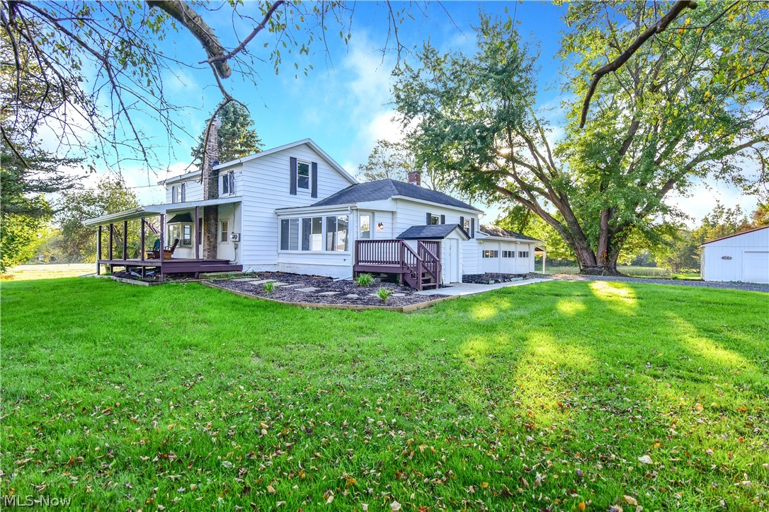 COMPLETELY UPDATED 4 Bedroom/3 Full Bath Home with 3 Car Attached Garage, 2 Car Detached Garage, Large 4 Stall Barn/Outbuilding & Back  Pond on almost 5 ACRES.  Home Features Include:  Large Front Living Room, Awesome Updated Kitchen with New Countertops, New Cabinets, and Stunning Hardwood Floors, First Floor Master Bedroom with Master Bath,  Second Bedroom with Second Full Bath, & 1/2 Bath.   Second Floor Offers 2 Large Bedrooms and 3rd Full Bath.  Updates Include:  All New Plumbing, New Windows, New Kitchen, New Baths, 3 New Decks., New Light Fixtures, All New Flooring, and a Fresh Coat Of Paint.