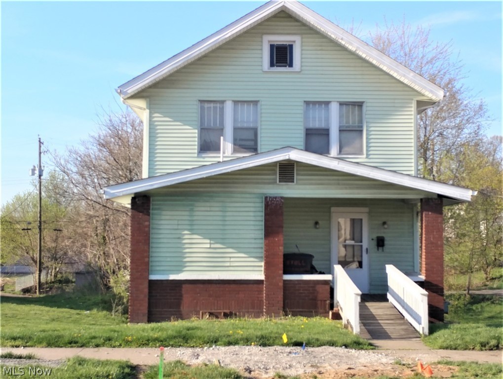 Affordable home with three bedrooms, two baths, with an additional lot. Convenient location close to downtown.