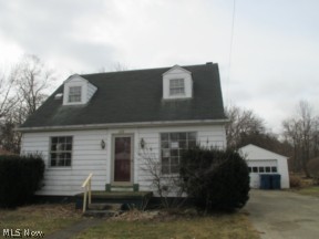 Charming 2 bedroom cape cod style home with full basement and 1 car detached garage.  Selling as-is.  Purchase this property for as little as 5% down!!