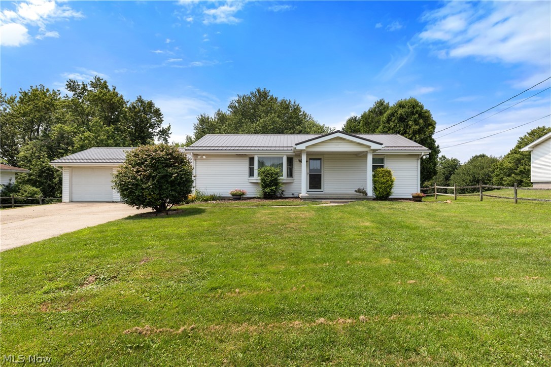 Looking for a home that's been truly cared for? This one checks all the boxes! Situated on a level 0.45-acre lot in Belmont, this 2-3 bedroom home offers the flexible space, updates, and location buyers have been waiting for. You'll appreciate the convenience of the single story living layout, featuring laundry in the breezeway that connects the 2-car garage, a full bathroom with brand-new tub, and two bedrooms, including a primary suite with its own spacious half bath. The finished basement offers another half bath and gives you the flexibility for a third bedroom, home office, rec room, or whatever fits your lifestyle. The seller has stayed ahead on maintenance with a metal roof (2021), biannual septic, furnace, and heat pump servicing, plus quarterly Buckeye Pest treatments—giving you confidence from day one. You'll love the curb appeal that the brand-new bay window and front door add, storage shed for your outdoor tools, large deck for evening meals, and plenty of room to enjoy the outdoors. All this in a peaceful setting just 5 minutes from I-70 and only 10 minutes from St. Clairsville. Call your favorite realtor to schedule your showing today!