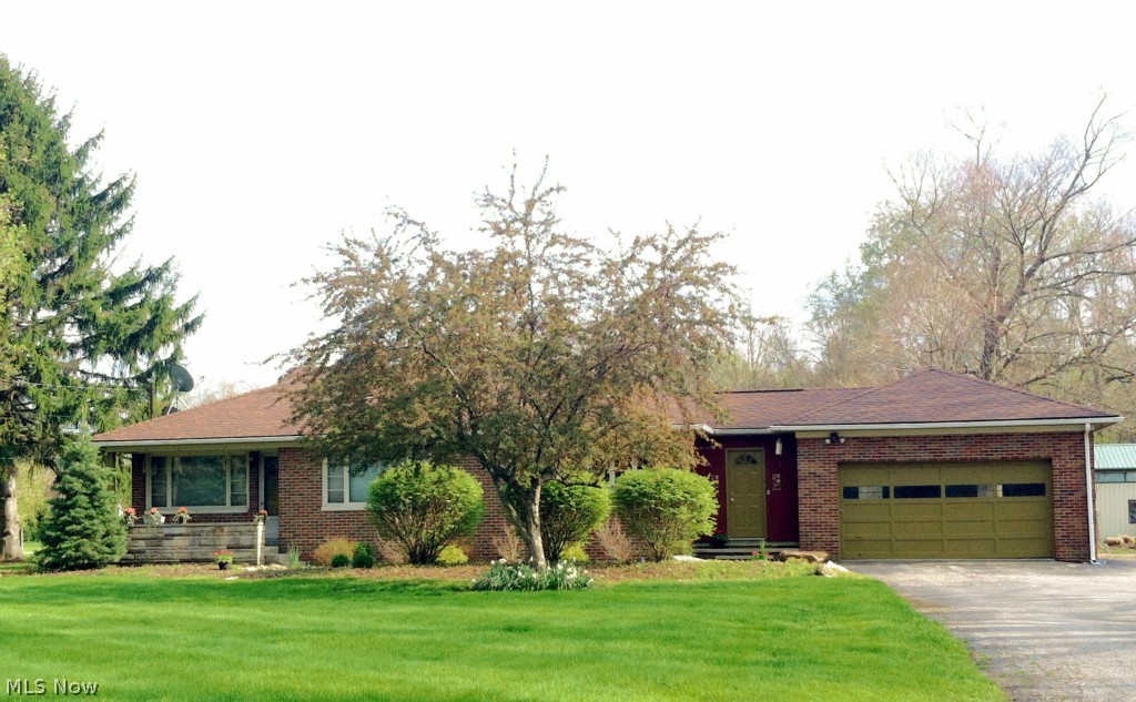Completely updated, mechanics dream in award winning Highland Schools! Brick ranch nestled on a dead end street next to a gorgeous pond. Two bedrooms on the main floor and one huge bedroom with wood burning fireplace on the lower level. Finished rec room and newly remodeled full bath also on the lower level. Beautiful kitchen with newer oak cabinets, and stainless steel appliances. Wood floors gleam in the dining room, living room and 2nd bedroom on the main floor. Massive 48x34 out building with electric, heat and water. Pool surrounded by a wood deck and new paver patio with custom fire pit. Outdoor wood/coal boiler. Don't miss this amazing opportunity!