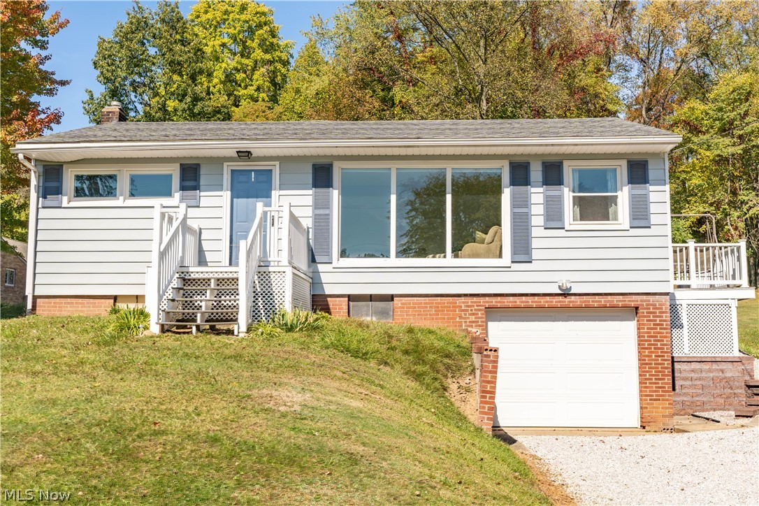 Are you looking for a ranch with over an acre of land in Green Local schools? Here it is! Enjoy the privacy that East Nimisila Road brings with plenty of active wildlife, including convenience to local grocery stores, brunch restaurants and nearly less than 10 minutes from the highway. The laundry has been moved to the first floor, but can easily be turned back into another bedroom if you prefer. The full bath has been updated with LVP, a newer softener system has been installed, newer paint throughout, and the basement is partially finished, ready for your final touches! Schedule a showing today!