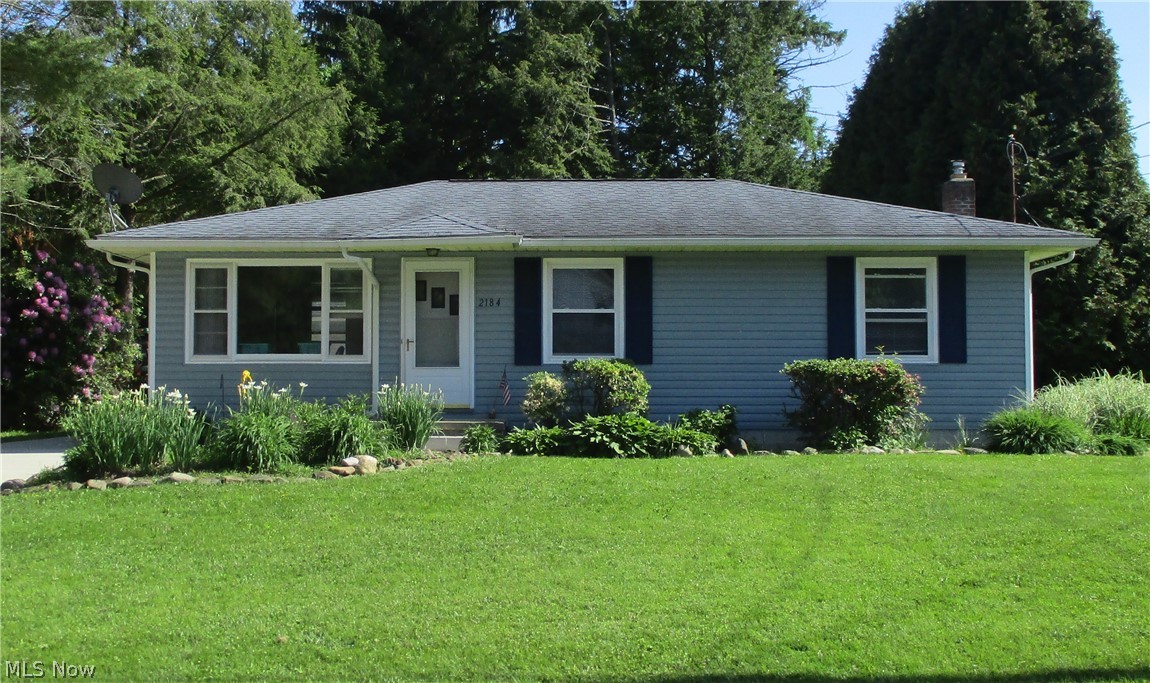 Wait till you see this!  Move in ready ranch with beautiful hardwoods and a great backyard with a firepit area! There's lots of light throughout the house and you won't want to miss the large garage with attached workshop area! Clean and dry basement is ready to make it what you want.  Updates include electric panel 2019, hardwood refinished 2019, garage gutters, kitchen countertops, cement drive, back patio, front walk and porch, hot water heater 2017, sump pump 2019, garage door, roof app 13 years old.