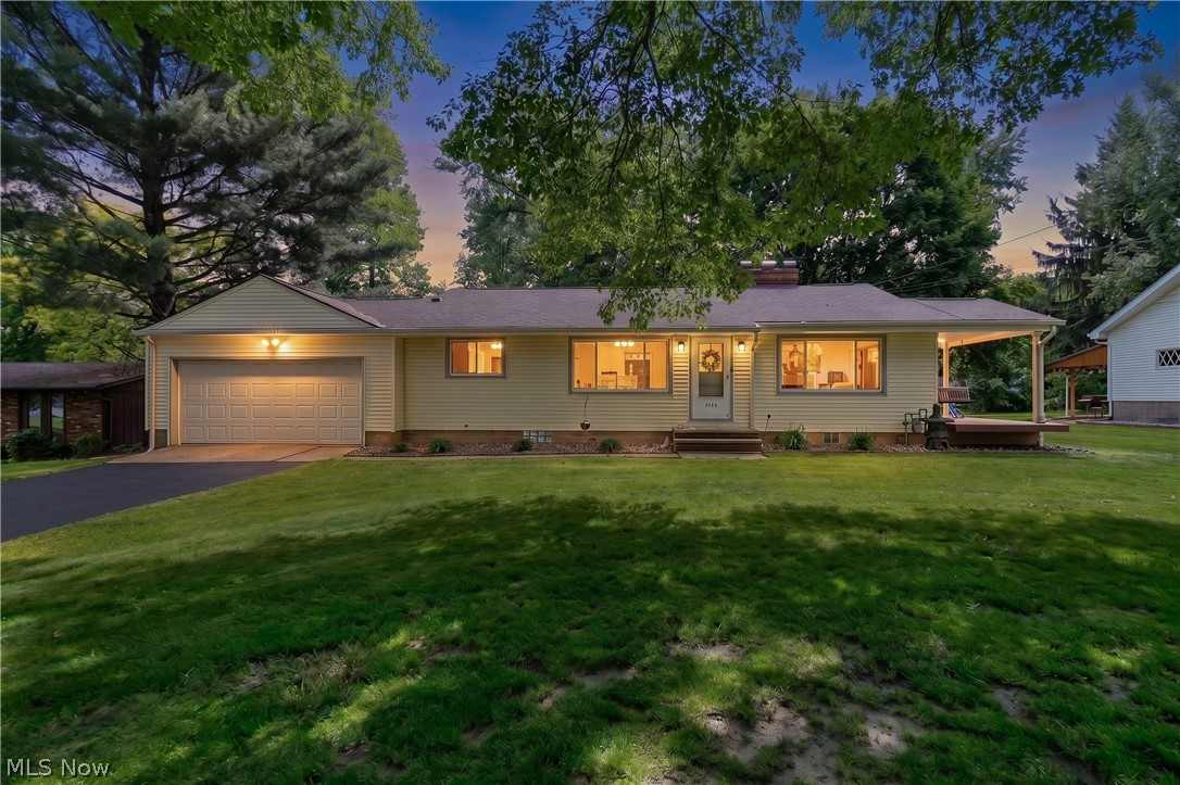 Welcome to 3321 Rowena Rd, a beautifully updated and meticulously maintained 3-bedroom, 1.5-bath ranch situated on a picturesque half-acre lot in desirable Coventry Township. Offering nearly 1,200 square feet of thoughtfully designed living space, this move-in-ready home combines modern updates, quality craftsmanship, and a peaceful setting that is becoming increasingly difficult to find. From the moment you arrive, you'll appreciate the pride of ownership that shines throughout every inch of this property. This beauty feels like your own private retreat while still being conveniently located near shopping, dining, schools, parks, and the Portage Lakes area. Step inside to discover a bright and inviting interior featuring luxury vinyl plank flooring that adds both style and durability throughout the home. The heart of the property is the stunning kitchen, completely remodeled in 2022 with modern cabinetry, updated countertops, and a full suite of newer appliances. Whether you're preparing a quick meal or hosting family gatherings, this space offers both functionality and contemporary appeal. The home's thoughtful updates continue throughout, including a fully remodeled bathroom completed in 2026, providing a fresh, modern feel with quality finishes and fixtures. Additional major improvements include a newer roof and a water filtration system, offering added peace of mind and long-term value for the next owner. The spacious living areas are filled with natural light and provide a comfortable atmosphere for everyday living. Three well-sized bedrooms offer flexibility for families, guests, a home office, or hobby space. Located in the highly sought-after Coventry area, this home offers easy access to nearby parks, recreational opportunities, and the Portage Lakes, where residents enjoy boating, fishing, dining, and year-round outdoor activities. Don't wait! Call for your showing today!