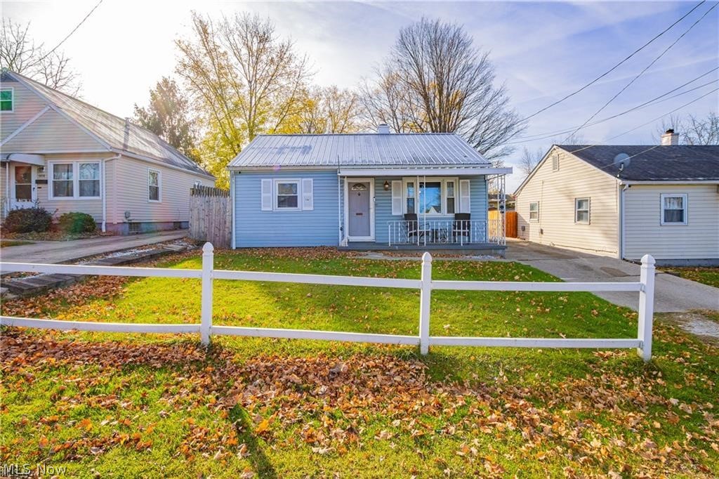 Discover this beautifully remodeled ranch home, ideally located near everything—including Summa Health Barberton Campus. This charming two-bedroom, one-bath home offers modern updates throughout, featuring a fully updated kitchen and bathroom (2022) complete with stainless steel appliances and new luxury vinyl flooring.
Enjoy peace of mind with a quality  metal roof on both the home and the one-car detached garage. Major mechanical updates include a completely replaced electric service in 2022 (new weather head, meter, and panel) along with a new gas service meter. A newer hot water tank (2018) adds to the home’s overall efficiency.
Convenient first-floor laundry just off the kitchen makes everyday living easy. Step outside to relax on the large covered front porch or entertain on the spacious back patio—perfect for evenings at home. The fully fenced-in backyard offers privacy and plenty of space for outdoor activities.
This home blends modern upgrades with a prime location—don’t miss your opportunity to make it yours!