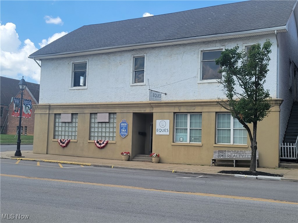 Over 10,000 sq ft, very well maintained Investment property.  6 Office spaces, 4 currently rented with long-term renters and service garage.  There is an apartment in the upper level that can be rehabed and utilized as well, but not currently in use. Vacant offices could be converted to apartments . Additional, potential income estimated at $3000/mo.  This property has been a part of Cadiz Village for many years and has been well taken care of by the current owners who are ready to retire and dispose of this property.  Call today to schedule a showing.