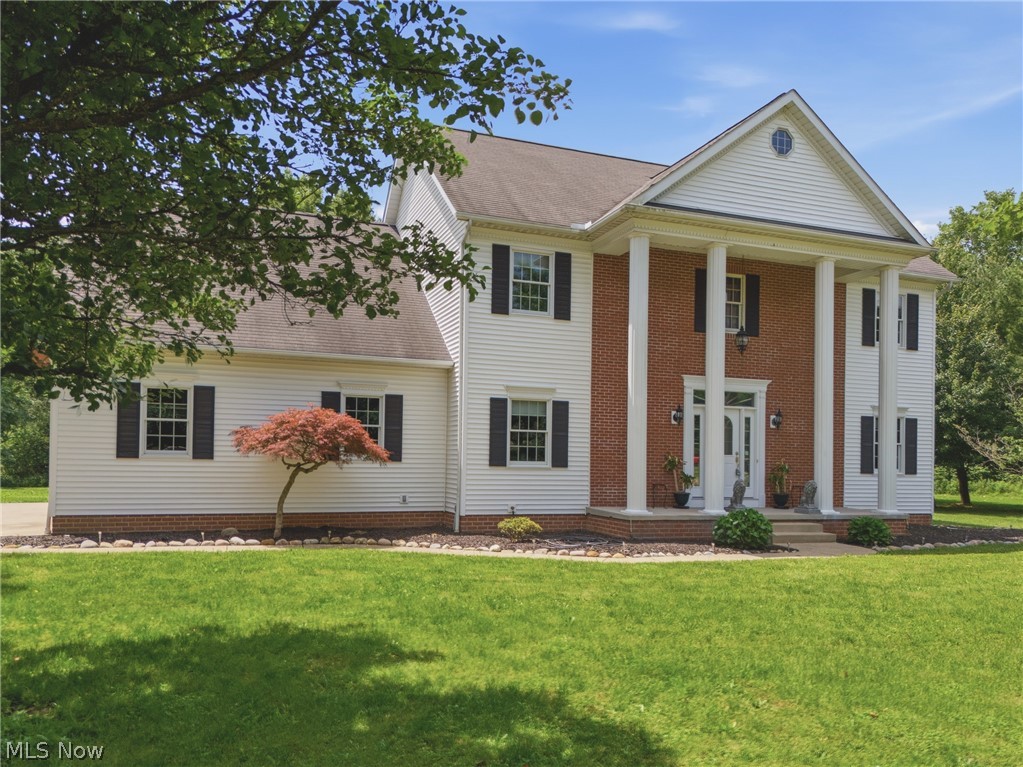 Welcome to this stunning custom-built, one-owner home in the highly sought-after Green School District! Filled with natural light and featuring 9-foot ceilings throughout, this home offers the perfect blend of comfort and elegance. The spacious living room showcases a cozy wood-burning fireplace and opens to a private patio overlooking the partially fenced backyard—ideal for relaxing or entertaining. The well-appointed kitchen offers abundant counter space and flows seamlessly into the formal dining room. A first-floor office and half bath add everyday convenience. Upstairs, the vaulted primary suite is a true retreat with a spa-like bath featuring a soaking tub, separate shower, oversized walk-in closet, and private balcony. Three additional generously sized bedrooms, a full bath, and a large bonus room with its own balcony—perfect as a fifth bedroom, playroom, or media room—complete the second floor. The walk-out basement with 9-foot ceilings, a gas fireplace, and endless finishing potential offers even more living space. Additional highlights include a whole-home generator, water softener, dumbwaiter from the second floor to the basement, large storage shed, home warranty, and nearly an acre of flat, usable land. This exceptional property offers space, quality, and an unbeatable location close to everything Green has to offer.