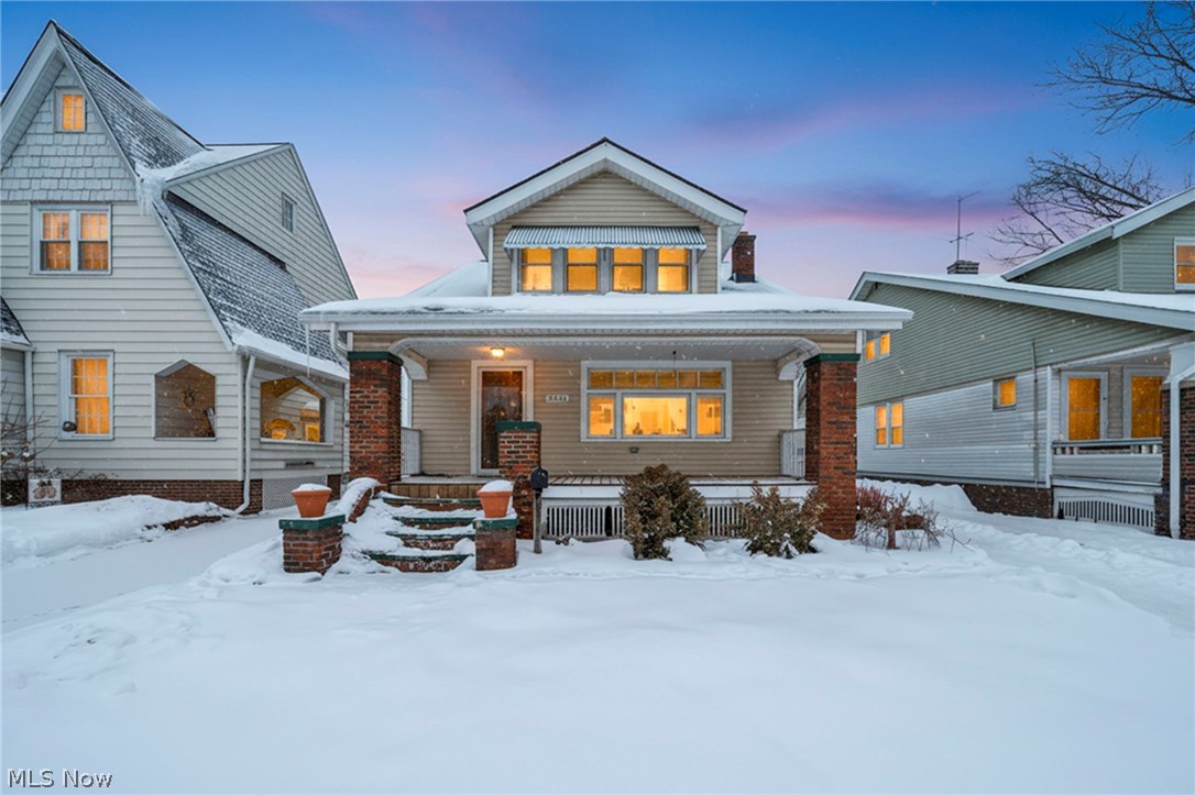 Magnificent, thoughtfully updated home where modern comforts blend seamlessly w/preserved original charm, including beautiful custom woodwork & classic leaded-style glass. Exceptional 4-bedroom, 2-bath Western Bungalow offers outstanding flexibility w/two bedrooms plus full bath on each level, finished basement, ideal for comfortable everyday living. Large, rebuilt front porch invites relaxation &  sets the tone for the character found throughout, highlighted by rich natural woodwork, crown molding, & leaded glass windows. Major updates include vinyl replacement windows, updated furnace, central air for year-round comfort, remodeled baths, glass block windows, & heated gutters. Inviting living room features a gas fireplace framed by original woodwork & elegant crown molding, while the formal dining room showcases hardwood floors, charming window seat, & leaded glass built-in cabinetry. Eat-in kitchen is well-appointed & includes all upgraded appliances. Impressive owner’s suite is a true retreat with a vaulted ceiling, oversized walk-in closet, and a beautifully updated private bath featuring ceramic flooring, ample counter space, and a stylish vessel sink. Outdoors, enjoy a fully fenced, patio, storage shed,oversized 2.5+ car garage w/additional storage above. Additional improvements include a roof approximately five years old, new sewer line from the house to the street, updated electrical box, newer washer and dryer, all included. Meticulously maintained throughout, this home truly reflects pride of ownership and is a pleasure to show.