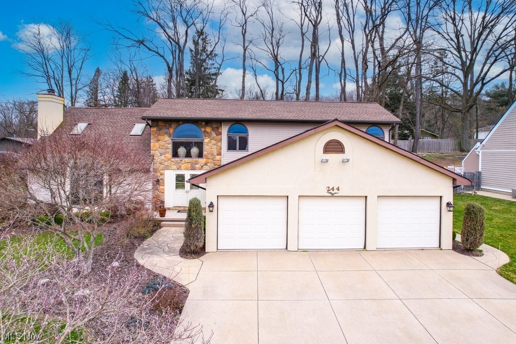 This stunning home is located in a desirable neighborhood, close to many Parks and Trails. Trudy Lake is part of the homeownership and offers a gorgeous view.  244 Silver Valley Blvd greets you with a well-manicured lawn & a charming front entrance. You'll step into a spacious foyer, which leads to a bright & airy living room with a fireplace & large windows that let in plenty of natural light. The open floor plan, with 1st floor laundry, has a seamless flow throughout. The family room has a double fireplace, open to the primary bdrm, to cozy up to on those cold evenings.
The kitchen has granite countertops, plenty of cabinet space, a large center island with a butcher block top and an inset gas stove top perfect for food preparation or casual dining. 
Directly off the dining room is an amazing Sun Room leading to a roomy deck which includes a hot tub to relax in after a long day. 
There are 3 spacious Bdrms,  including a luxurious primary suite, a private oasis, with a large walk-i
