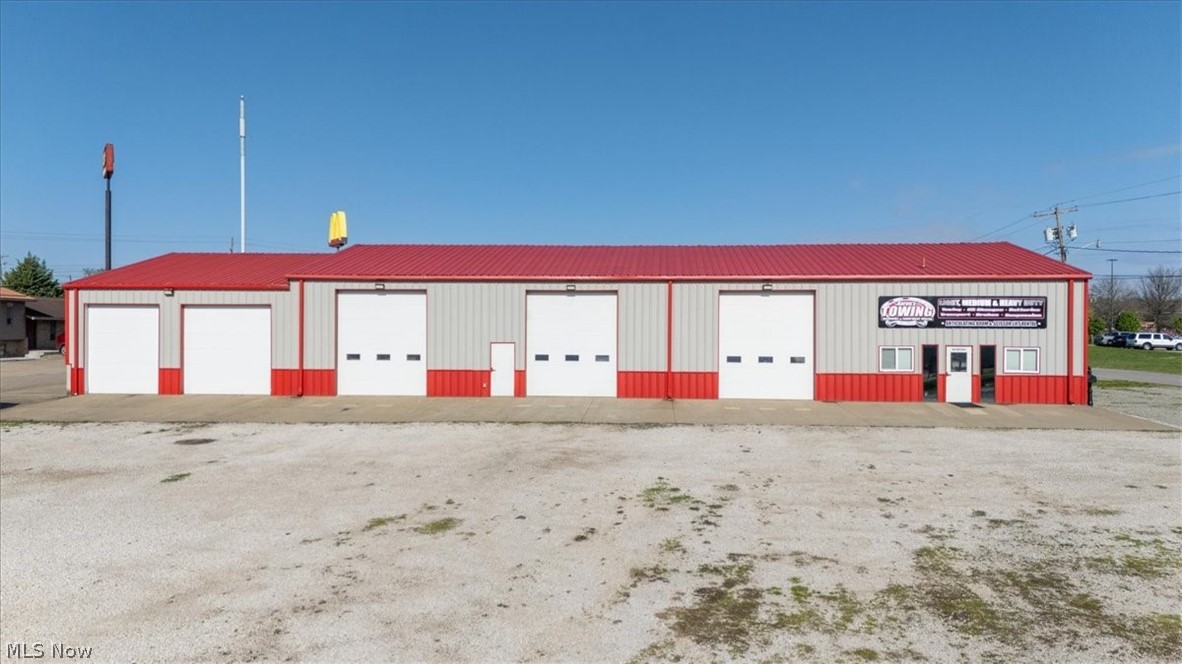 An awesome opportunity to own this - like new Commercial building. Located next to Sam's Club, right in the heart of  Vienna, WV's thriving business district. This Approx . 8,000 sq/ft building has two separate open concept shop/warehouse areas. one at 1,500 sq/ft and the other at 3,500 sq/ft. The petition separating these areas can easily be taken out to make for an open space of 5,000 sq/ft.
An additional 1,500 finished sq/ft on ground level could be for multi use. Above that has another 1,500 sq/ft with a blank canvas to fit any need. Floor drains in the shop include oil separator tanks.