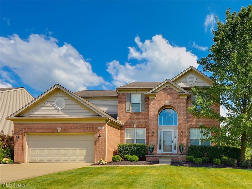 Exquisite Colonial situated in the highly desirable family friendly community of Calls Farm. Pristine inside and out, impressive curb appeal with well manicured lawn and landscaping . The foyer entry leads into the  formal living and formal dining room with gorgeous hardwood floors that continue throughout the first floor. The open concept floor plan is very appealing with a spacious fireplaced  family room adjoining the custom kitchen and second dining area. The cream colored kitchen cabinets brighten the room in addition to the many windows welcoming the sunlight. There is also stainless appliances, an island breakfast bar, pantry and built in work station or buffet plus a spacious mud room plumbed for a first floor laundry. Sliders step out to the custom built 16 x 12 screen room with a cathedral ceiling which overlooks the patio/basketball court, backyard play set and fenced yard which adjoins the private grassy field behind all maintained by the HOA. The first floor also has an of