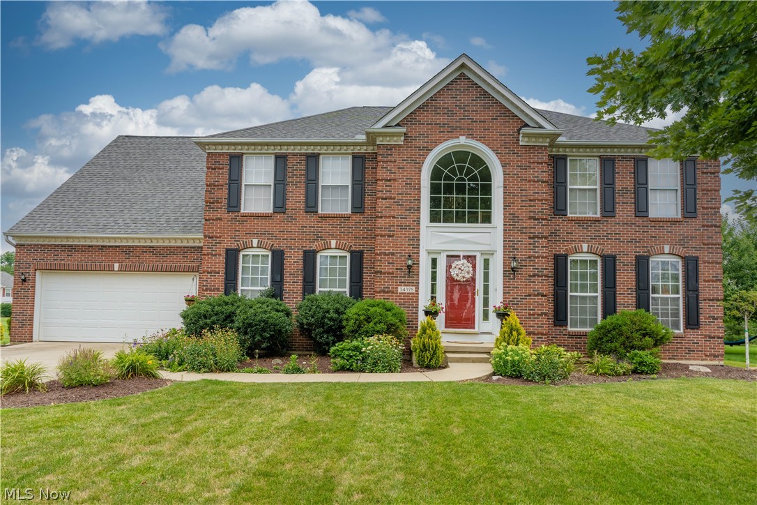 Welcome to this fantastic 4 bedroom, 2.5 bath colonial, w/ 2 car attached garage located in Wildwood Estates – no HOA! With over 2,800 sq. ft. above ground, plus a full basement, this home has space for everyone. 2 story foyer with tons of windows & natural light. Living room has gas fireplace and is open to the updated kitchen with granite countertops & stainless steel appliances. Convenient 1st floor laundry. Rounding out the main level is a home office and dining room. Upstairs through the double doors is the master suite which has 2 walk in closets.  The en suite master bath has double sinks, stand up shower, & soaking tub. The other 3 generously sized bedrooms share a full hall bath. Enjoy summer evenings grilling on the deck with your retractable awning or lounging in the above ground pool heated with solar panels. The gorgeous willow tree adds so much character and the yard is completely fenced in for pets & kids. The full basement offers tons of extra storage plus a bonus finished space. Other updates include: Above ground pool (2020), deduct water meter for pool (2020), Shed (2020), New flooring in foyer and 3 bedrooms (2020), Kitchen granite countertops, backsplash, and tile floor (2019), New toilets (2019), half bath vanity (2019), foyer window (2017), Hot water tank (2015), HVAC (2015), Roof (approx. 2013), kitchen appliances & washer/dryer less than 5 years old, new paint in many rooms (2022), deck and electric retractable awning (2002), backyard fence (2001).