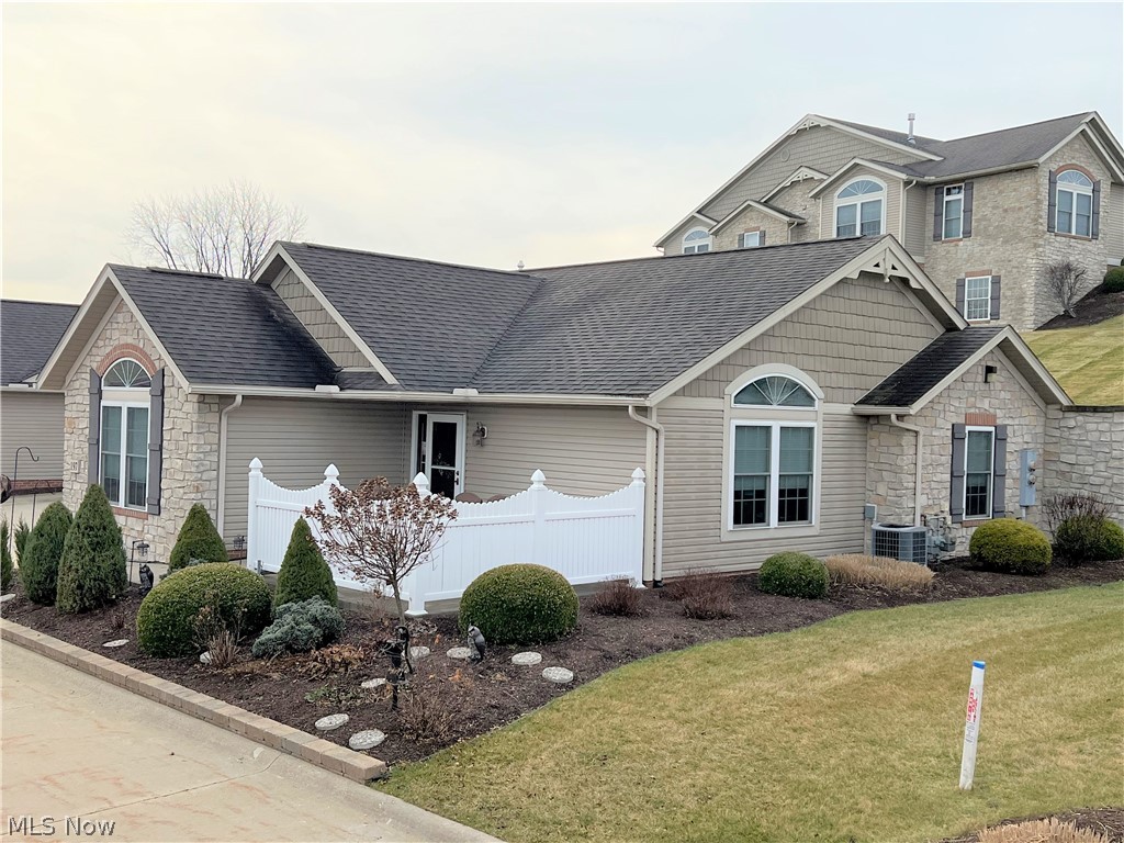 Beautiful, like new, 2 BR, 2 bath, 2 car garage Heritage Crossing condo in Sugarcreek. New carpet in living area and all major appliances included. Vaulted ceiling and fireplace in living room. Heated garage. Low maintenance, easy living lifestyle.