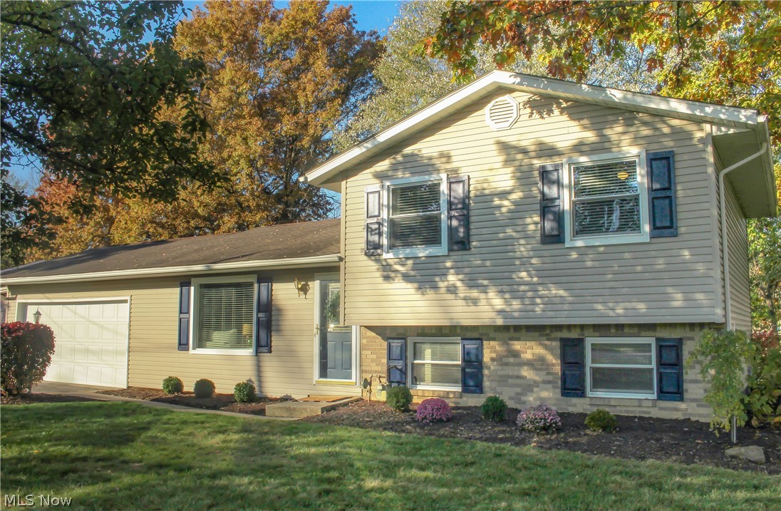 Beautiful Split Level located in the sought-after Brentwood Estates neighborhood. Located just minutes from the Norton Elementary School, this completely updated 4 bedroom, 1.5 bathroom home is turn-key and ready for it's new owners! Upon entrance, you are greeted by the spacious living room that is open to the dining room and kitchen. Upstairs you will find 3 bedrooms, including the master, and a full bathroom. On the lower level, there is a fourth bedroom, a half bathroom, and a large bonus room as another living space. There is plenty of storage in the basement. The backyard includes a nice-sized enclosed deck as well as a patio with a fireplace and an outbuilding. Close to shopping, the highway, and the Norton Middle School and High School.