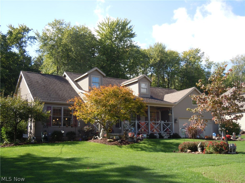 Custom built in 2002; this lovely ranch home features an open floor plan with cathedral ceiling. The stone fireplace will make winter evenings cozy for your family. The cook of the home will be delighted with the lovely hickory cabinets which feature a cabinet for your mixer, trash receptacle cabinet and cookie sheet cabinet. You’ll find a handy pantry as well. From the dining area you can walk out onto the maintenance free deck to enjoy the lovely yard and landscaping. One of the bedrooms is currently used as an office and features glass doors. The master bedroom has its own walk-in closet and bath with two sinks and walk-in shower. Other features include an oversize, heated two car garage, basement plumbed for a bath, Andersen windows, and newer water heater (2016). A Home Warranty is provided for the buyer’s peace of mind.