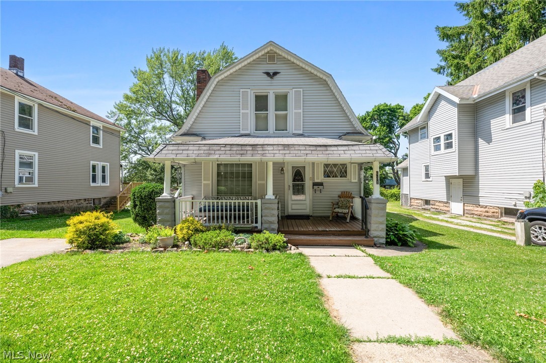 Step into the timeless charm of this lovingly maintained 1910 century home, cherished by the same family since 1982. Situated on two parcels in Ashtabula City, this spacious property offers a generous yard, attached rear garage, and plenty of off-street parking. Inside, you'll appreciate the character and craftsmanship that have stood the test of time, with many original architectural details still beautifully preserved. A covered front porch leads to a welcoming foyer with glass doors that open to the combined living and dining room, complete with built-ins, creating an inviting space for everyday living and entertaining. The bright, eat-in kitchen offers abundant natural light. The main level also features a convenient first floor bedroom, full bath, and a versatile den perfect for a home office, playroom or additional living space. Upstairs, you'll find three comfortable bedrooms and a second full bath. A full basement provides excellent storage and access to the attached garage. Whether you're searching for your first home or a fantastic investment opportunity, this well-cared for property offers classic charm, functional living space, and endless potential!