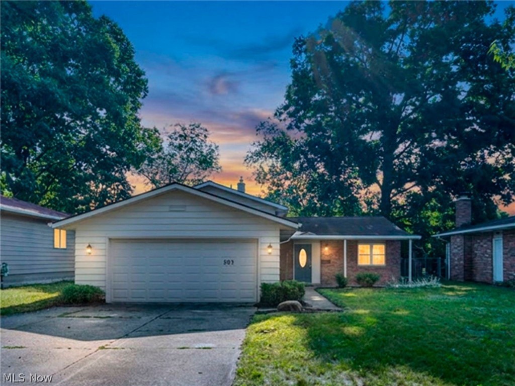 Welcome home to 509 Silver Meadows Blvd! This beautifully updated, move-in ready, split-level features 3 bedrooms, 1.5 baths, and 1,752 sq. ft. of freshly renovated living space. Step inside to an inviting open-concept main floor designed for seamless entertaining. The heart of the home features a completely redone kitchen equipped with updated cabinetry, crisp countertops, a classic subway tile backsplash, and a dedicated dining area. Just a few steps down, discover a spacious lower-level family room, ideal for unwinding, hosting movie nights, or creating a dedicated game room, along with a convenient half bath. The utility room off the lower living space houses the washer/dryer and offers ample extra storage. Upstairs, you'll find three bright bedrooms and a full bath.
Enjoy year-round outdoor living in the expansive, fully enclosed back patio! The enclosure overlooks a large, private, tree-lined backyard offering plenty of shade and a bonus storage shed.  Don't miss out on this Kent gem; schedule your tour today!
