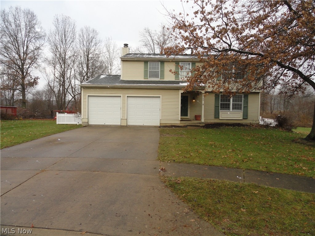 Silver Springs Colonial situated on a large fenced lot at the end of the Cul de Sac in this popular family friendly neighborhood.  Spacious, open and bright.  Many rooms with hardwood floors, beautiful slate foyer and kitchen floor..  Formal living and  formal dining, eat in kitchen, open to family room with fireplace.  Sliders open to large deck and flat open yard with plenty of room to run plus it overlooks Silver Springs park!  Nicely updated kitchen and bathrooms. 4 bedrooms including  a private master suite with walk in closet.  Open basement for storage or room to finish, and a man cave too!  Lovely home.  Great location.