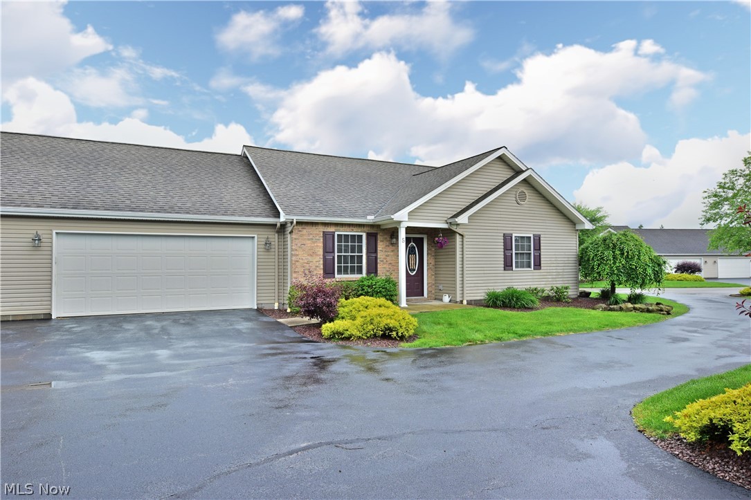 So many updates in this easy Living, Open Concept, 3-bedroom, 2 bath ranch condo in the desirable Nora Glen. This lovely home offers a large great room with vaulted ceilings, beautiful hickory floors, large open eat-in kitchen featuring new hickory cabinets, granite counter-tops and newer stainless steel appliances.  The added nice sized sun room with wall to wall windows lets you take advantage of the natural light and enjoy the view of the outdoors, including your relaxing patio for your entertainment needs. The over-sized Master bedroom boasts a walk in closet, while the Master Bath features a walk in shower and granite counter-top with a double bowl vanity. Another bedroom with easy access to the main bath is located off the large hall area, which is currently being used as office space. Not to be outdone, the upstairs loft bedroom has two closets and can double as an additional family room. Finishing the living space is the first floor laundry room with a utility sink and cabinets