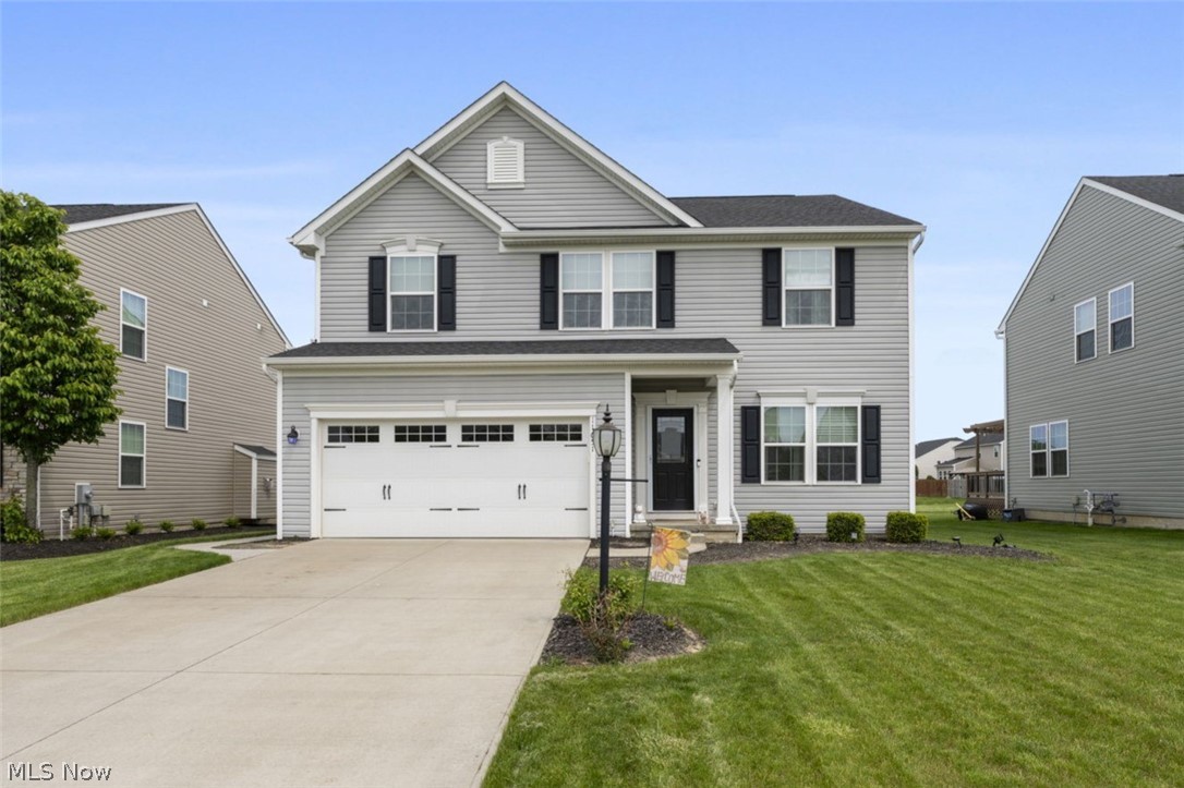 Welcome home to this beautifully maintained colonial located in the highly sought-after Hunting Meadows community in Columbia Station! Offering over 3,200 square feet of thoughtfully designed living space, this stunning 4-bedroom, 2 full and 2 half-bath home perfectly blends comfort, style, and functionality.Step inside to an open-concept floor plan featuring 9-foot ceilings, abundant natural light, and a spacious family room centered around a cozy fireplace. The heart of the home is the impressive kitchen, complete with granite countertops, a center island, stainless steel appliances, and brand-new hardwood flooring installed in May 2026. Upstairs, you’ll find a generously sized owner’s suite featuring a private en-suite bath and dual walk-in closets. Three additional bedrooms, a full bath, and the convenience of second-floor laundry complete the upper level. The finished lower level provides additional living and entertaining space with a large recreation room and a convenient half bath. Outside, enjoy your fully fenced backyard and relax or entertain on the expansive stamped concrete patio. One of the property’s most desirable features is the backyard setting—with no rear neighbors, you’ll enjoy added privacy and peaceful views, creating the perfect space for outdoor gatherings, playtime, or simply unwinding at the end of the day. Built in 2017 and meticulously maintained, this move-in-ready home offers modern finishes, flexible living space, and an unbeatable location in one of Columbia Station’s most desirable neighborhoods. Don’t miss your opportunity to make this exceptional property your next home!