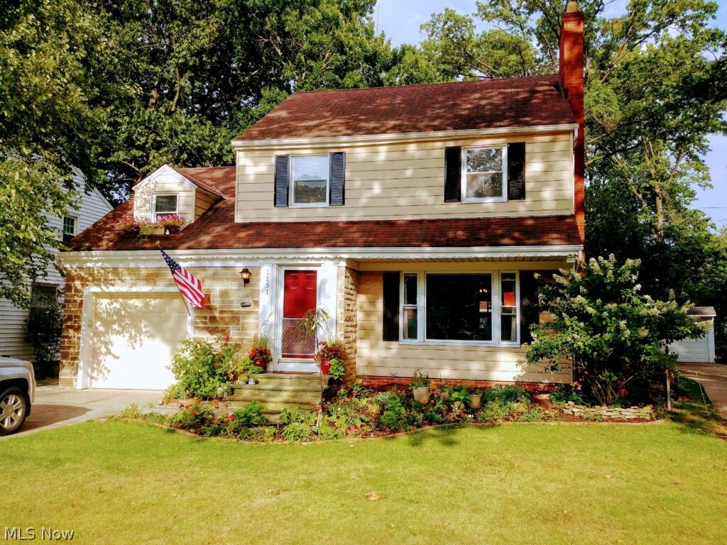 Wonderful, spacious colonial on a gracious Boulevard. Tastefully updated. All new kitchen cabinets and new flooring. New granite counter tops and stainless steel appliances. The enhanced functional layout offer plenty of storage and work area.  Light filled living room and dining room with hard wood floors. New sliding glass doors in the family provide a wonderful view of the newly planted, lush landscaping as well as access to the brand new 12' X 14' deck. Mature trees provide cool shade in the large, Fully fenced, back yard. New concrete patio.  All three bedrooms are generously sized with plenty of storage space. Huge master bedroom with access to finished, heated third floor studio/flex space. Warm, bright, finished basement recreation room. Vinyl windows 2014. New hot water tank. High efficiency furnace. Central air conditioning.  A truly lovely home!