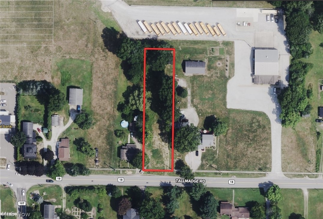 Situated in the Rootstown area of Portage County, Ohio, this 0.58-acre residential lot features flat, partially wooded terrain in a peaceful setting with nearby homes and natural surroundings. Public water and power are available per seller, adding convenience for future development. With easy access to local shops, dining, schools, and major roadways, this property offers a great opportunity to build a future home or hold as an investment.