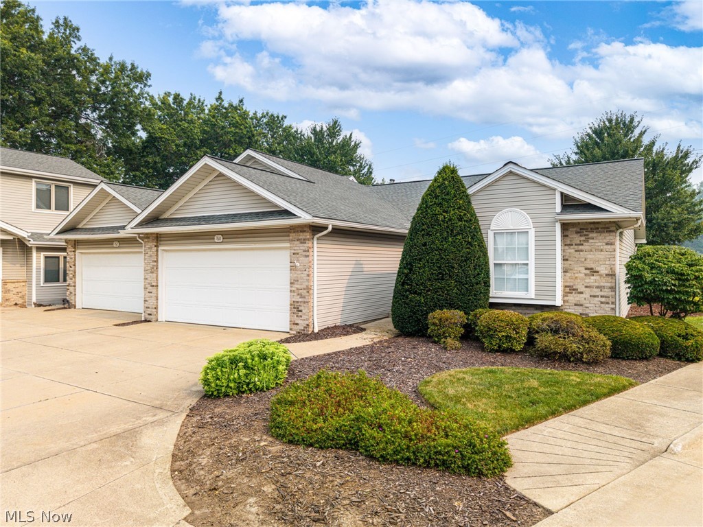 Welcome home to this beautiful, move-in-ready condo at 760 Renee Drive! From the moment you step inside, you will love the bright and airy open floor plan, highlighted by soaring cathedral ceilings and a cozy gas fireplace in the spacious living room—perfect for relaxing evenings. The heart of the home features a wonderful kitchen with a breakfast bar for morning coffee or casual entertaining, and all appliances stay for your convenience!

Relax and unwind in the spacious owner's suite, complete with a private bath and a generous walk-in closet. The main level also offers the ultimate convenience of first-floor laundry. Step through the sliding doors in the living area to enjoy peaceful afternoons on your private deck, or head downstairs to the full basement, offering a clean slate that is ready for your personalization, extra storage, or future finished space.

Best of all, you can leave the outdoor chores behind! The association fee covers both landscaping and snow removal, giving you true low-maintenance living. For the ultimate peace of mind, a one-year home warranty with America's Preferred is included for the buyer. Schedule your tour today!