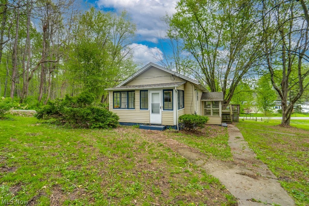 Move right into this beautifully renovated 3-bedroom ranch situated on a desirable corner lot in Ravenna, offering easy single-floor living with a bright and inviting sunroom and an enclosed porch—perfect for relaxing, entertaining, or enjoying the outdoors in comfort year-round. Inside, you’ll find a clean, updated interior with a functional layout designed for everyday living, making this home truly move-in ready. The full unfinished basement provides excellent storage and offers the potential to be finished for additional living space down the road. What truly sets this property apart is the land: three parcels totaling approximately .67 acres, giving you flexibility for extra outdoor space, future building potential, or added privacy. A solid, updated home with room to grow—don’t miss this opportunity.
