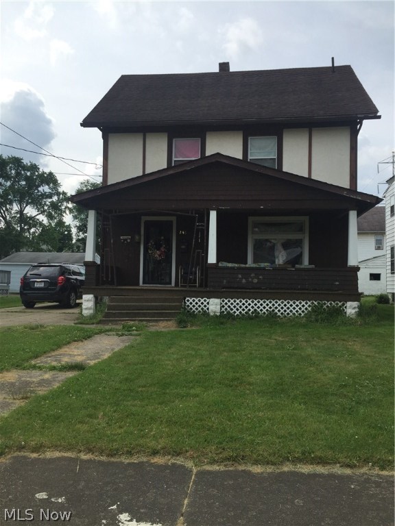 Looking for a fixer upper?  This is it!  Large 3-4 bedroom home features some newer windows,  It was once a duplex and could be converted back.  There is a kitchen on the second floor.  The extra deep 2.5 car garage would be great for the car enthusiast!  This home needs some cosmetic work but with the spacious design and the natural light that come in from plenty of  windows it will make someone willing to put the work in a lovely home!