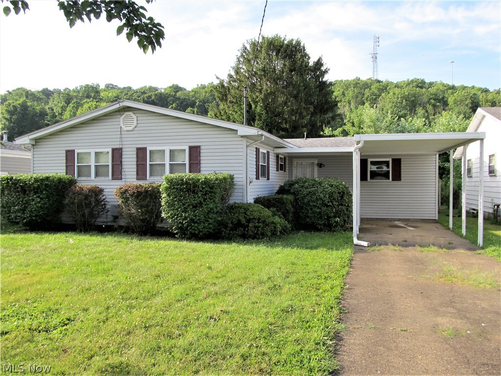 Darling 3 bedroom, 1.5 bath Belpre ranch. Lovely front porch and covered back patio. Spacious rooms. Totally one floor living. Master has nice walk-in closet. Partially fenced and very private back yard. Home Warranty provided.