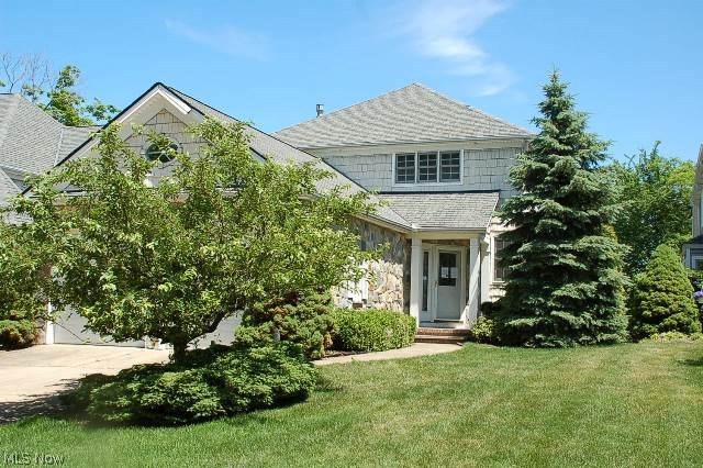 Stunning detached cluster offers remarkable Metropark views! Inside, you will find a lovely foyer, large great room with custom built ins flanking the fireplace, vaulted ceilings, large formal dining with crown molding, den with coffered ceiling, eat in kitchen, first floor laundry, new ss appliances, first floor master suite with jetted tub, an awesome heated sun room with amazing views, 2 large bedrooms up with a full bath each, a spacious loft, finished basement with partial second kitchen and plenty of storage throughout! Beautiful rare find in Rocky River!