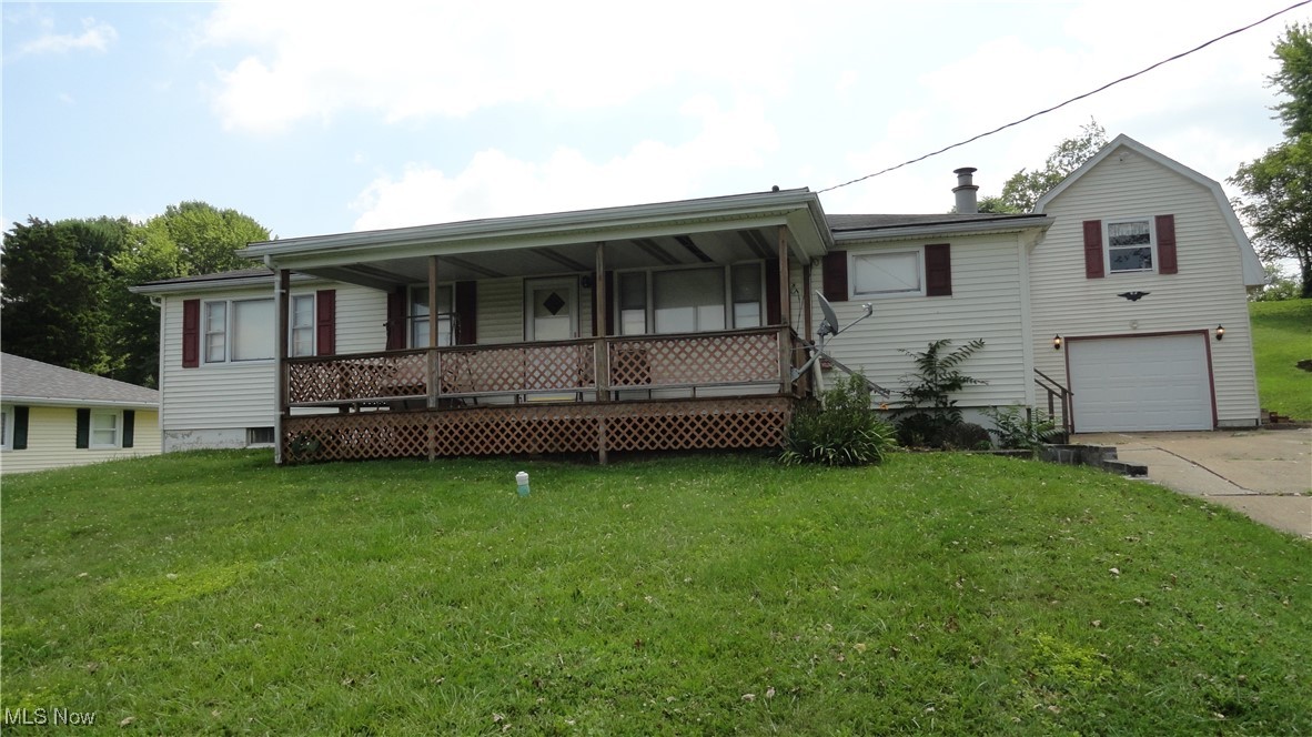 Own a piece of Americana!  Sears and Roebuck Catalog home.  Well maintained ranch home with lovely country setting.  Enjoy the sunset from the 9x24 covered front deck.  3 bedrooms, one of which now has laundry, full bath, huge living room, large dining room with spacious kitchen round out the main floor.  Beautiful hardwood floors under the carpet.  Basement has 3 main areas that can be finished, along with a shower/toilet space, and a fruit cellar.  Garage is detached with a wood shop upstairs.  Shed in back yard for more storage.  Nice yard, plenty of space for kids to play while adults sit and visit.  Comcast high speed internet available.  Brand new roof April of 2026!!