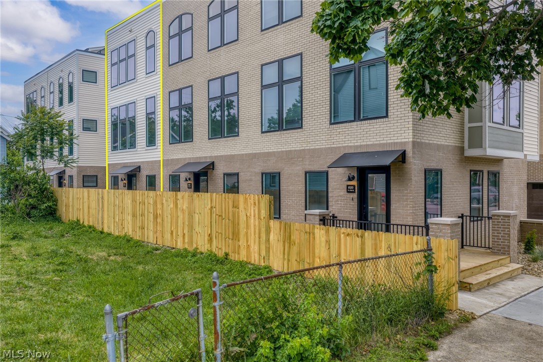 This is your LAST chance to secure one of the last remaining Gramercy Townhomes! Brand new, will be tax-abated, and perfectly positioned in Ohio City! Never-been-lived-in 2-bedroom, 2.5-bath TH offers one of the final opportunities to secure a FULL 15-year tax abatements, keeping your monthly payment approachable. Thoughtfully designed and refreshingly complete, this townhome checks every box. Inside, you’ll find soaring ceilings, energy-efficient vinyl windows, wide-plank luxury vinyl flooring throughout, and a beautifully finished kitchen with quartz countertops, full appliance package, and soft-close cabinetry. This unit offers "greyson" (lovely brown/gray color) cabinetry throughout with timeless brushed nickel hardware. Unlike many new builds, this home comes fully equipped with all appliances, including washer and dryer, plus installed window treatments.  The layout offers two spacious bedrooms, each serviced by its own bath along with a half bath for guests. An attached 2-car garage adds rare functionality while the showstopper awaits above. A private rooftop deck with 360-degree views perfect for entertaining or unwinding against Cleveland’s skyline sunsets. Part of an intimate 11-townhome community with two distinct floorplans and price points, this development delivers flexibility without sacrificing style. The low $100/month maintenance fee covers snow removal, trash, and common area upkeep, keeping ownership simple and predictable. Location? Just steps from the energy of Lorain Avenue and Gordon Square. Think local bookstores, cozy cafés, pizza spots and even the Redline Greenway bike trail. With one of the most attainable price points for new construction in the area, paired with full tax abatement and turnkey living, opportunities like this are both rare and fleeting!