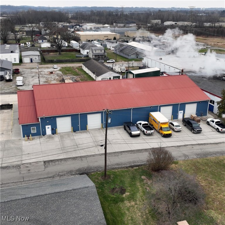 Modern industrial facility built in 2019, located in an M-1 Light Manufacturing District and situated on six parcels. The 80’ x 147.5’ building offers approximately 11,800 sq. ft. and features a concrete foundation, metal exterior walls and roof, and double-pane insulated vinyl windows. Interior includes epoxy-coated concrete floors, 14’ ceiling height, LED lighting throughout  and a ceiling fire suppression system with 159water sprinklers. Office areas feature painted drywall walls with gas-fired forced air heat and central A/C, while the warehouse is heated by four Modine gas-fired ceiling-hung heaters.

The property offers excellent access with seven overhead doors, including one 8’ x 8’ metal door and six 10’ x 12’ electric-operated metal doors. One restroom with wall-hung sink and water closet, plus an instantaneous water heater.

Income-producing opportunity with an existing tenant paying $5,000 per month, responsible for all utilities, and interested in remaining. Ideal for investors or owner-users seeking a modern, low-maintenance industrial asset.