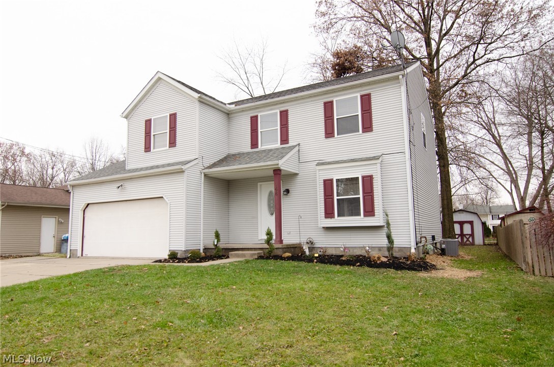 Picture perfect Mogadore home!  Give yourself the gift of a new home and snatch this beauty up, before it's gone.  All new carpeting throughout the second floor, stairs and dining room.  New luxury vinyl plank flooring in the hall, kitchen, breakfast area and half bath. The dining room is perfect for formal dinners, while the eating area in front of the sliding glass doors is a great spot for breakfast and to enjoy the view of your backyard.  The spacious family room has a real wood burning fireplace.  The kitchen has a great view, open for entertaining, has solid oak cabinets, large pantry and all new stainless steel appliances.  There is also a half bath and coat closet in the main hallway.  Upstairs, there is a great open hallway that leads to 3 bedrooms and 2 full baths.  The large master bedroom has a master bathroom with new flooring, toilet, tub and tile surround and a walk-in closet.  The other 2 bedrooms also have walk-in closets too.  There is a linen closet in the hall and t