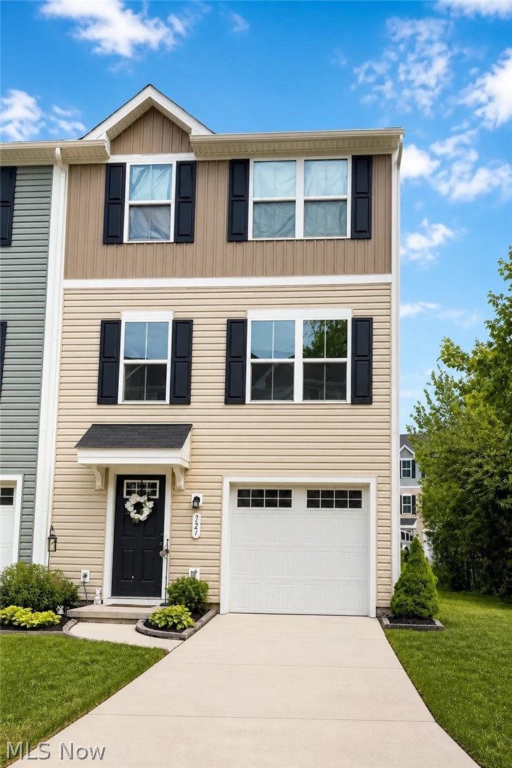 This 2021 end-unit 3-bedroom condo offers modern design, flexible space, and easy living with a low $90/month maintenance fee.  The open main floor showcases a kitchen with an eating area, an enclosed composite deck, and a sun-filled living room.  Upstairs, all bedrooms are conveniently located on one level, including a spacious primary suite with walk-in closet and ensuite bath, plus second full bath and laundry area. The ground floor includes a generous foyer with coat closet, garage, and a versatile mechanical/storage room—ideal for a workout space, workshop, or hobby room and a private patio. All appliances stay! This is that new home you've been waiting for!