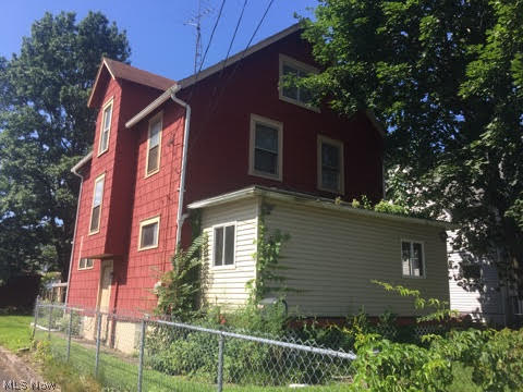 GREAT STARTER OR RENTAL PROPERTY priced to sell!  Possible extra bedrooms in upstairs walk up attic.