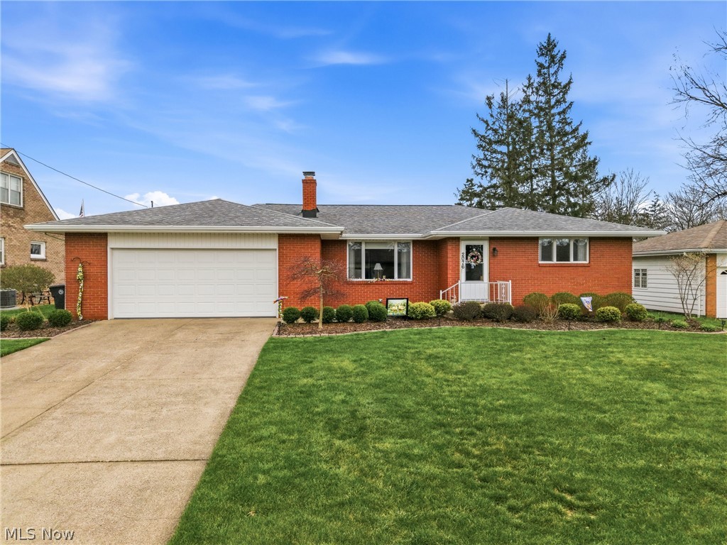 This solid, custom, brick ranch home with 3 bedrooms, and 1.5 baths is located on a quiet, dead-end street in the Howland School District. Extremely well-maintained with nice-sized rooms and ample windows to allow lots of sunlight in.  This home features a large living room with fireplace, and huge remodeled, eat-in kitchen with new sliding doors to new Trex decking and a generous back yard. There is new flooring in the kitchen and bathrooms, and numerous mechanical updates, including new air conditioning-2020, new furnace-2019, new dishwasher-2019, remodeled full bath. The attached double garage has newly-coated flooring & built-in storage.  The home also features a newer roof, electric service, water heater, and garage door. This peaceful neighborhood has virtually no traffic, aside from the immediate neighbors, yet it is close to all amenities. Call for a private viewing today!